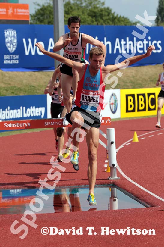 Mark Draper leads the 3000 metres steeplechase at the Sainsbury's British Championships, Birmingham.